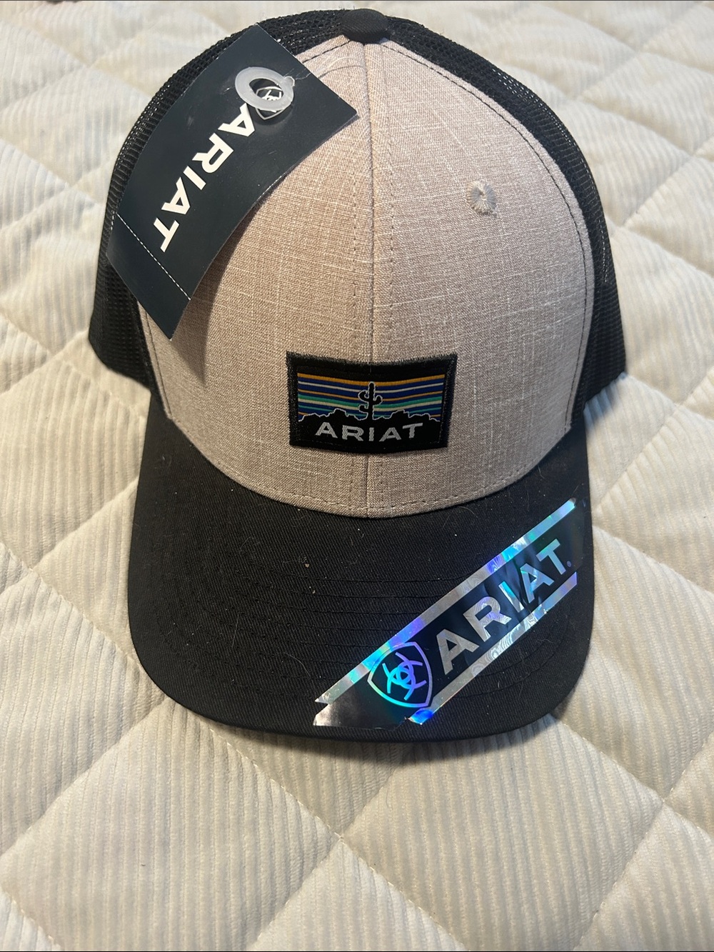Cap on quilted surface